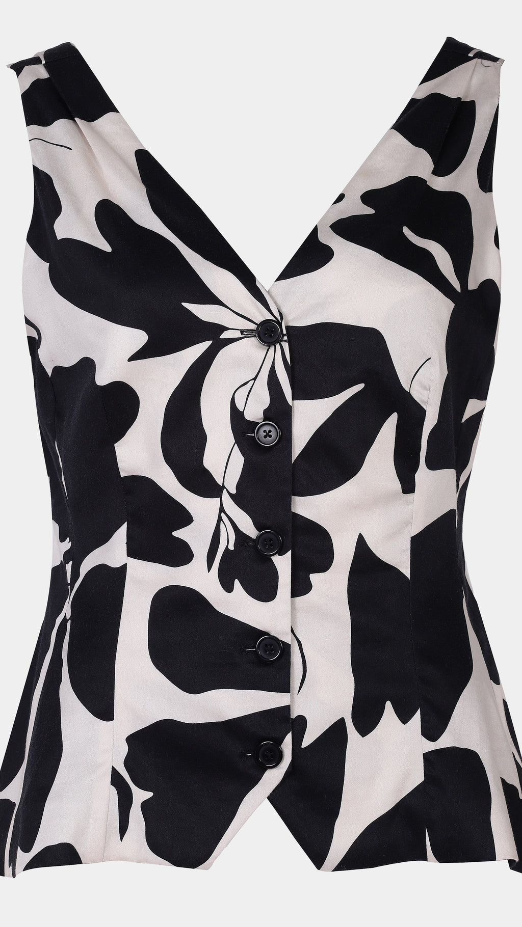 Black and white floral patterned sleeveless top on a light gray background