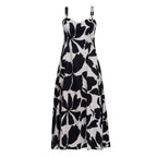 Black and white floral patterned dress on a white background