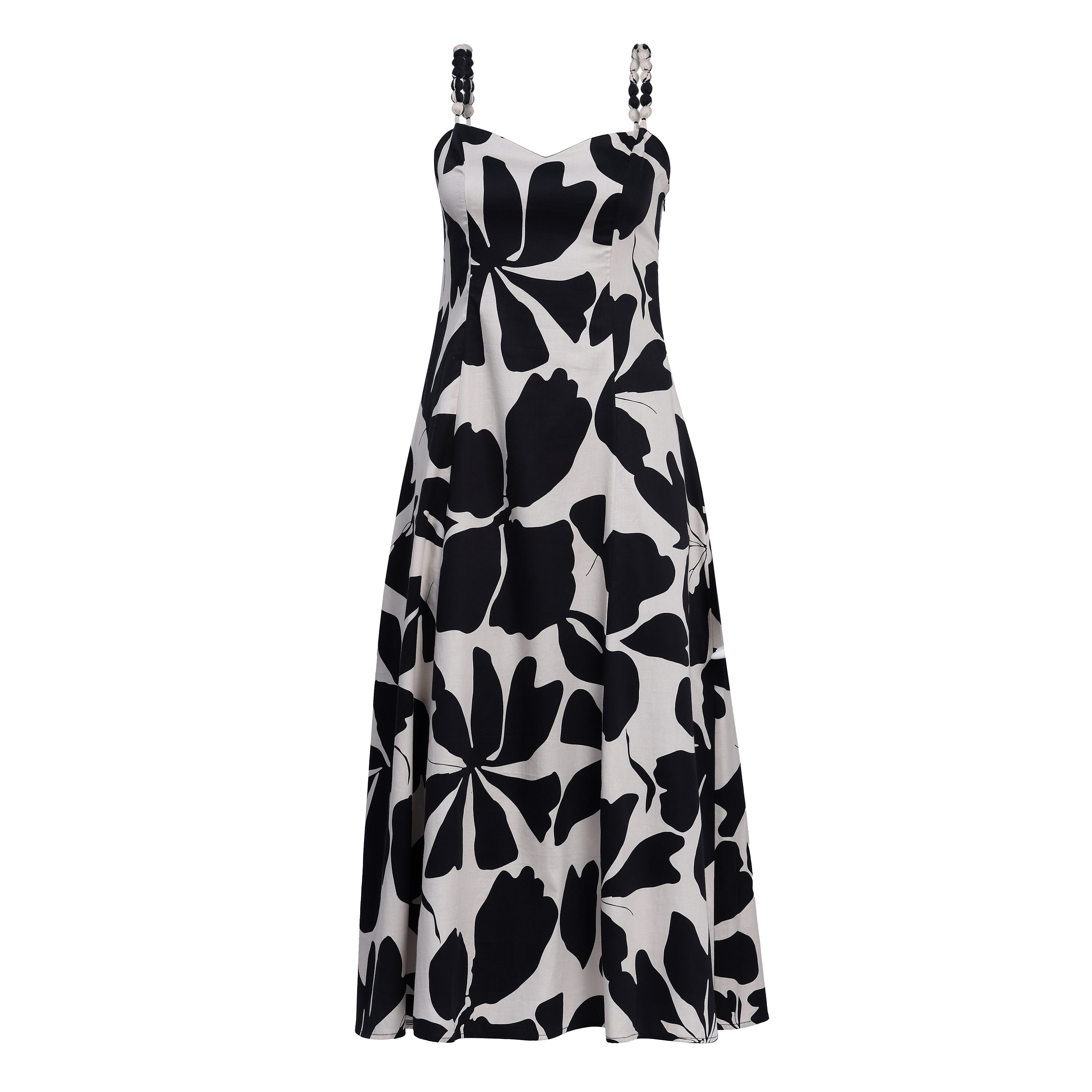 Black and white floral patterned dress on a white background