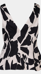 Black and white floral patterned dress on a white background