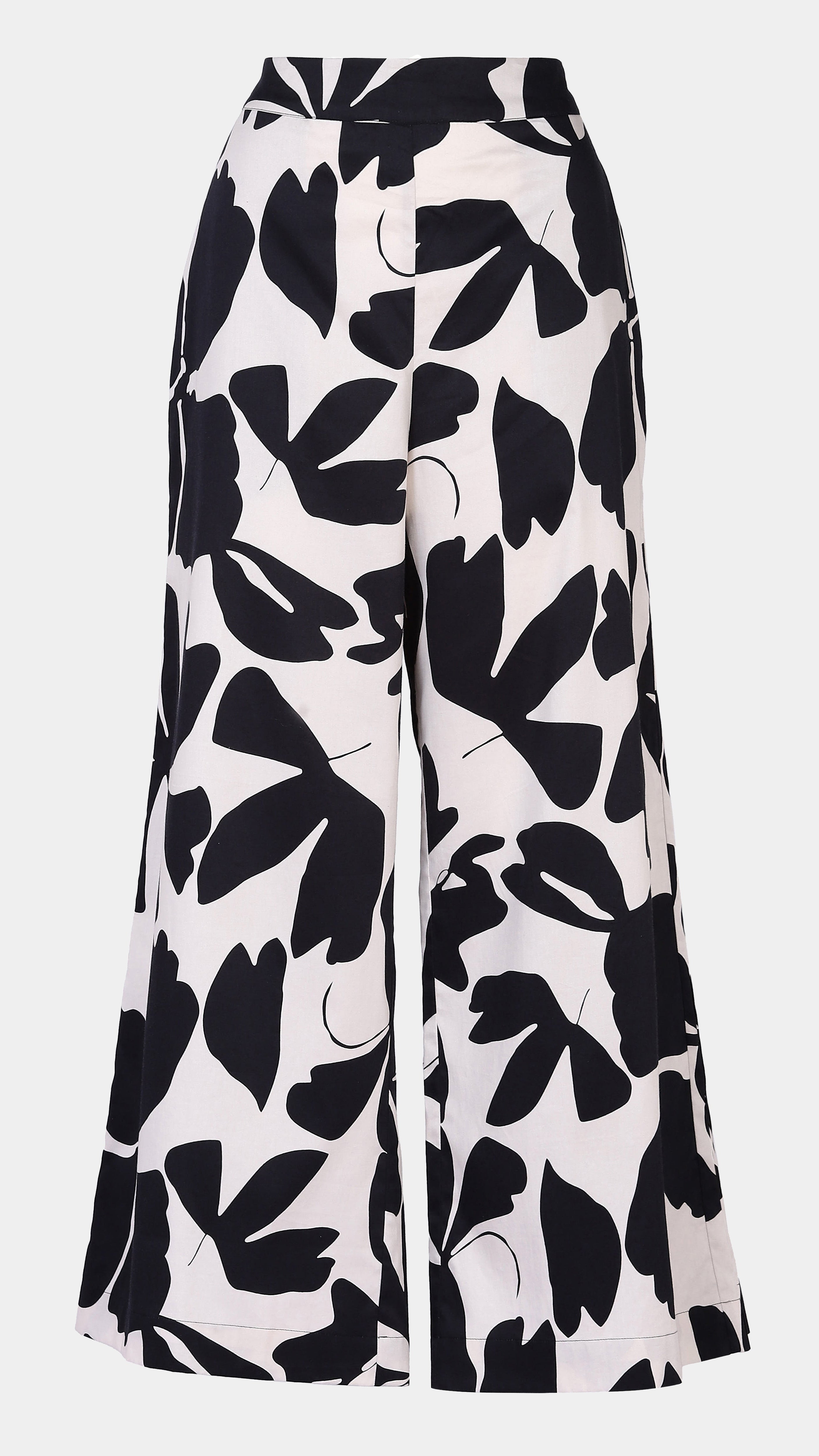 Black and white patterned pants on a light gray background