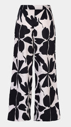Black floral patterned pants on a white background